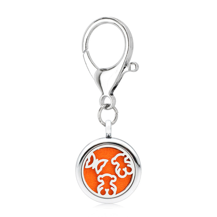 Wholesale Alloy 25MM Tree of Life Pink Ribbon Hollow Aromatherapy Essential Oil Keychain
